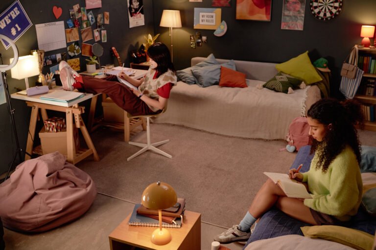 Studying in Cozy, Well-Decorated Bedroom Setup With Friends