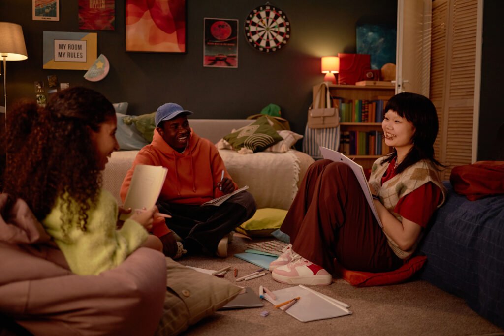Smiling Teens Studying in Cozy Bedroom Atmosphere