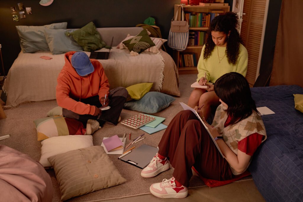 Students Studying in Cozy Living Room Setting