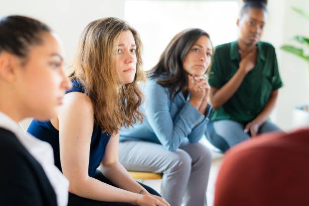 Diverse people in a support group session