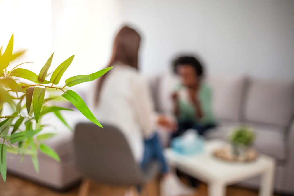 Close-up of psychotherapist analyzing patient's problem in the office