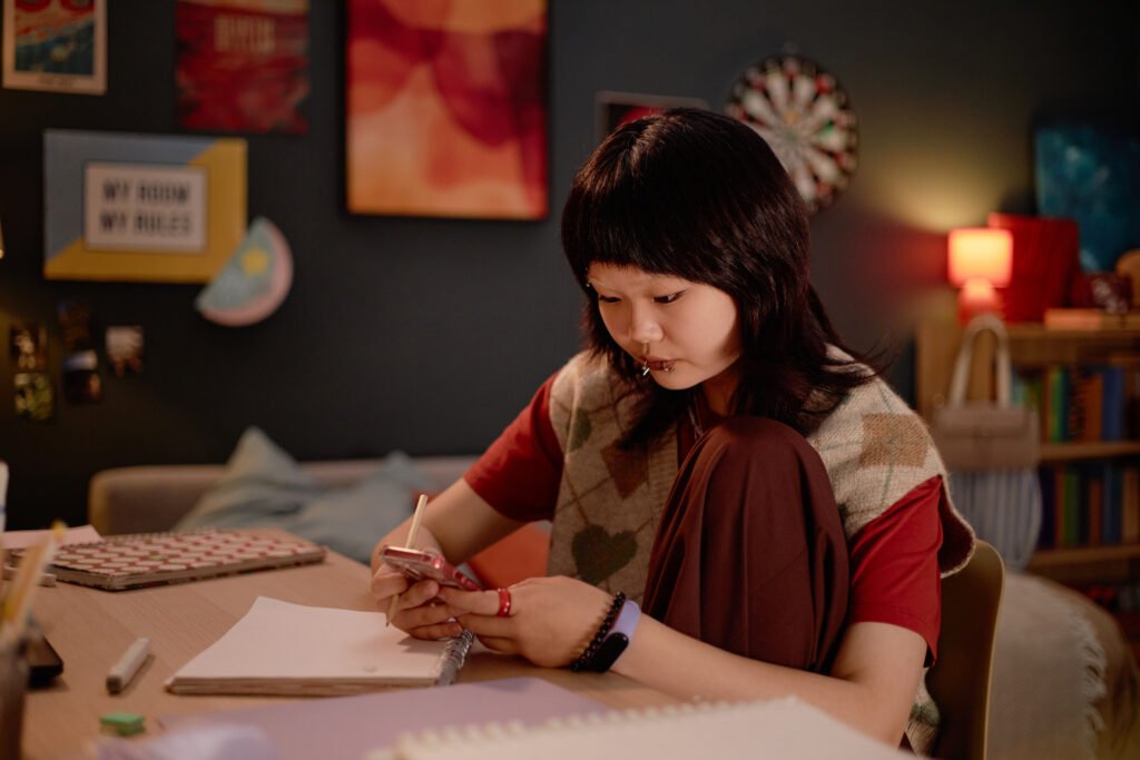 Studying in Cozy Bedroom with Soft Ambient Lighting