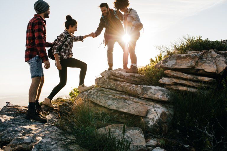 Group of friends hiking in mountain