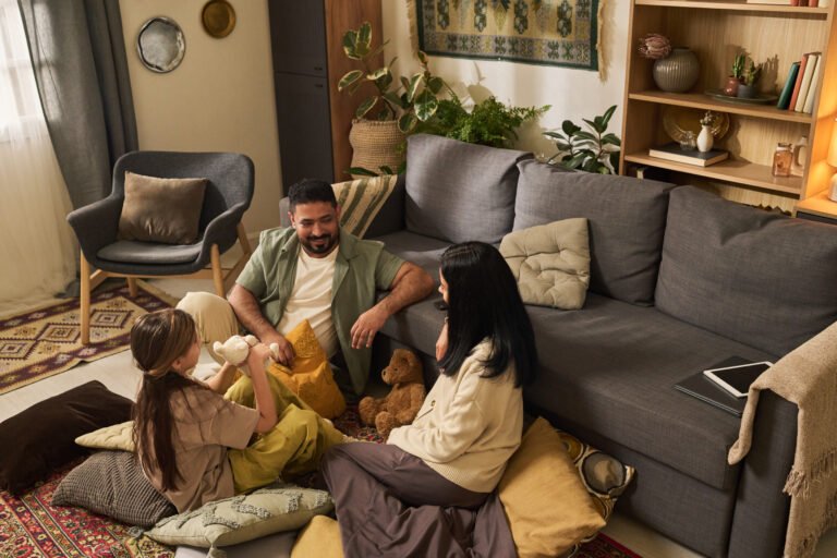 Smiling Family Enjoying Quality Time Together at Home