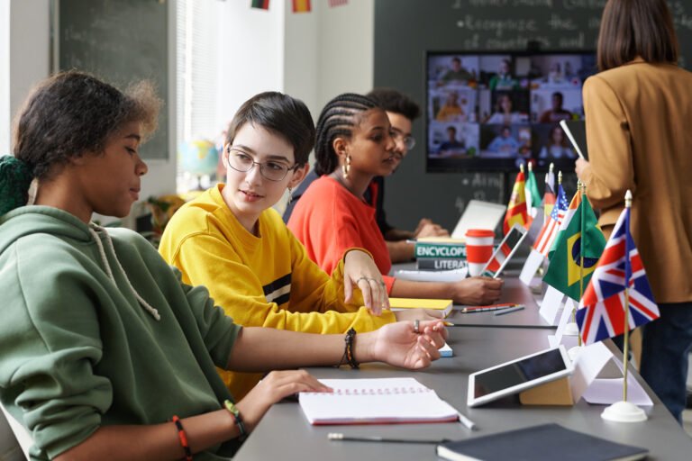 Diverse Group of Students Talking in Class